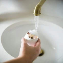 ReVive Lux Sonique Mini Cleanser Anti-Aging & Acne -Bumble Sale Store reVive Lux Sonique Mini CleansingBrush Acne AntiAging LightTherapy Lifestyle 3